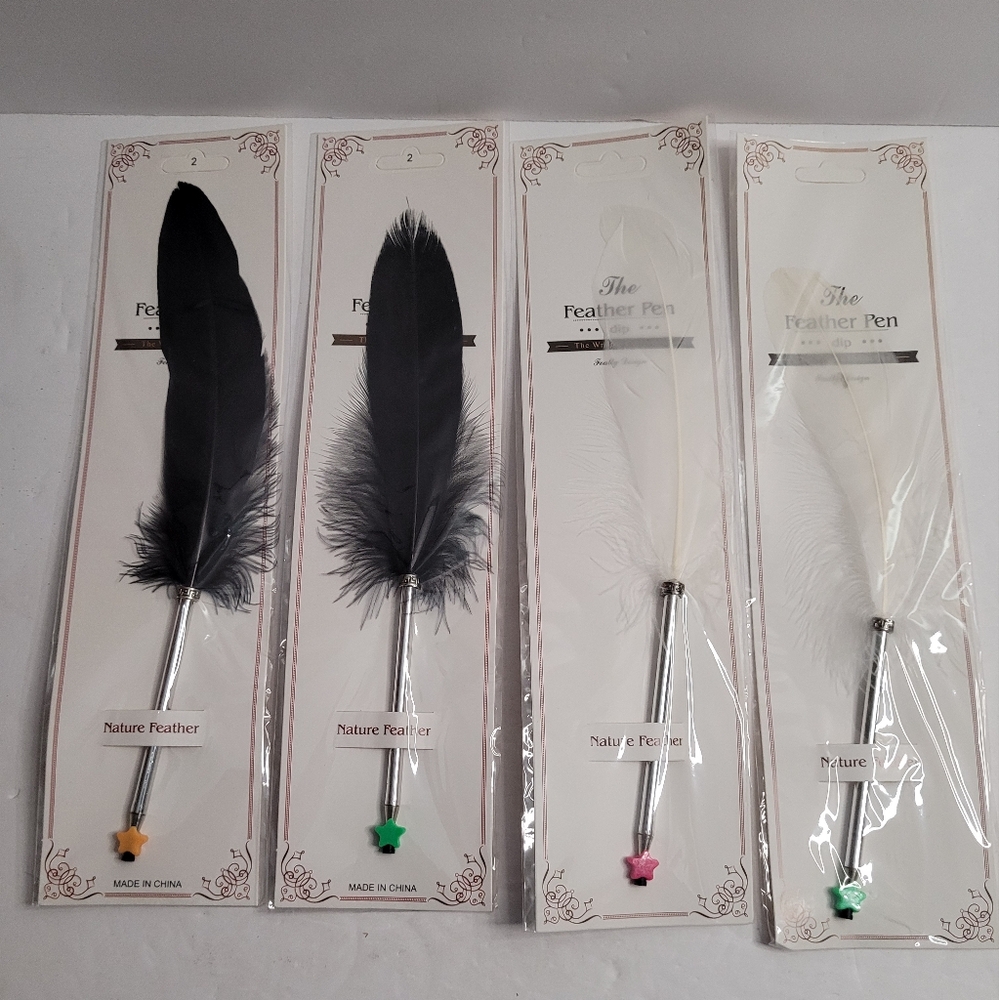 Feather ballpoint pens.  321